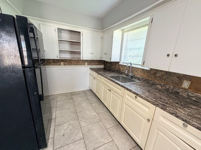 Building Photo - Affordable 3BR Brick Home with Carport