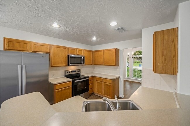 Building Photo - 18401 Sunrise Oaks Ct