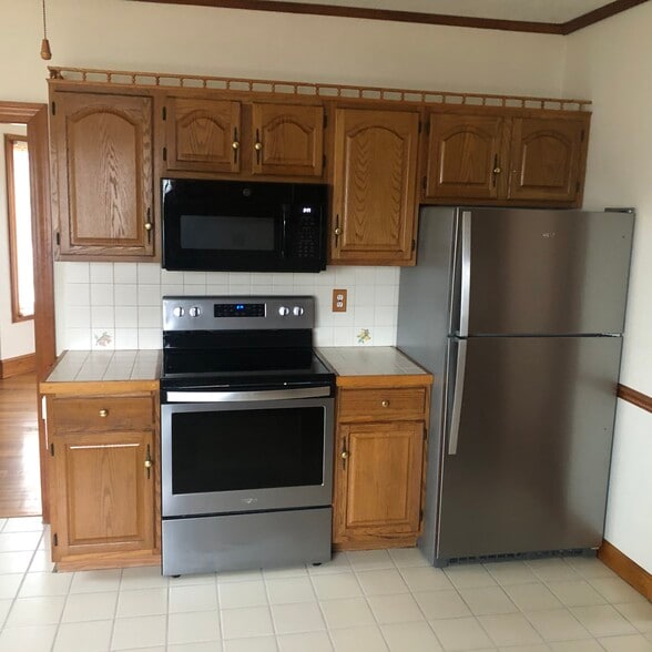 New fridge & micro, 6 month old range - 200 Park Ave