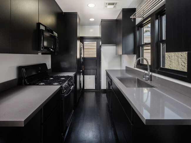 Modern Appliances & lots of Counter Space! - 1253 N Genesee Ave