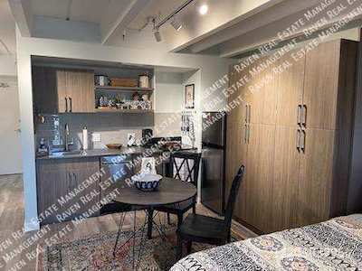 Building Photo - Fully Furnished Pet-Friendly Studio Apartm...