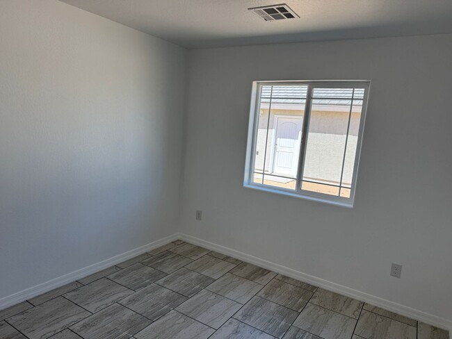 Building Photo - Brand New San Luis Three Bedroom Home
