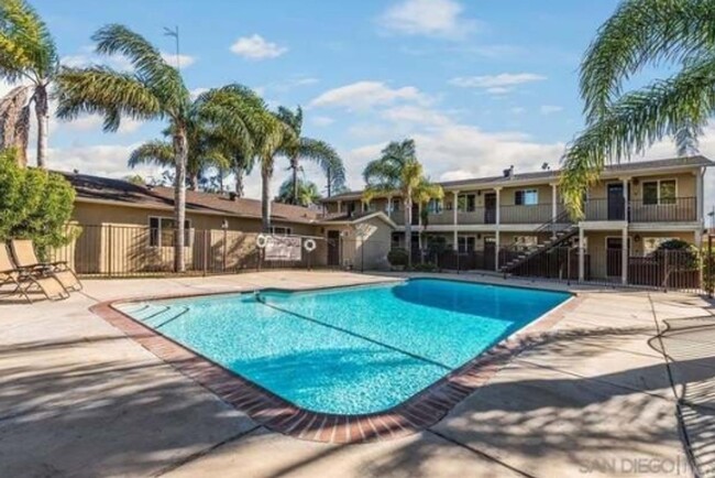 Building Photo - AFFORDABLE 1st Floor Condo & patio yard!