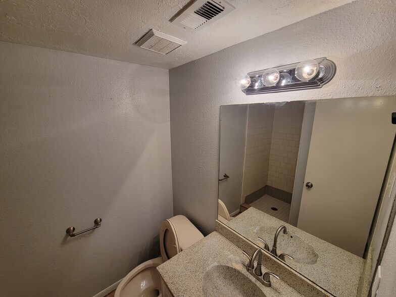 Main vanity - 12247 W Village Dr