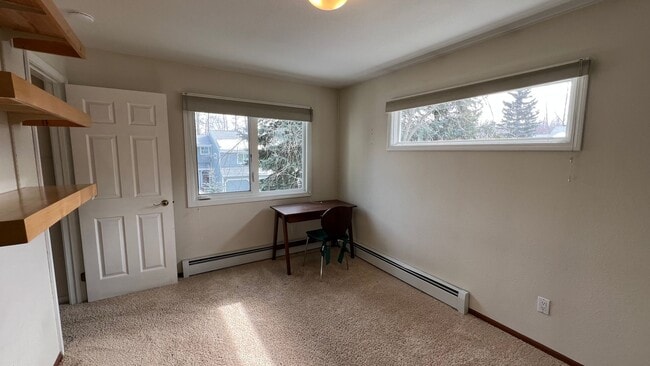 Building Photo - Lovely 2 Bedroom Townhouse Condo W/Garage - Corner Lot - Call Today!