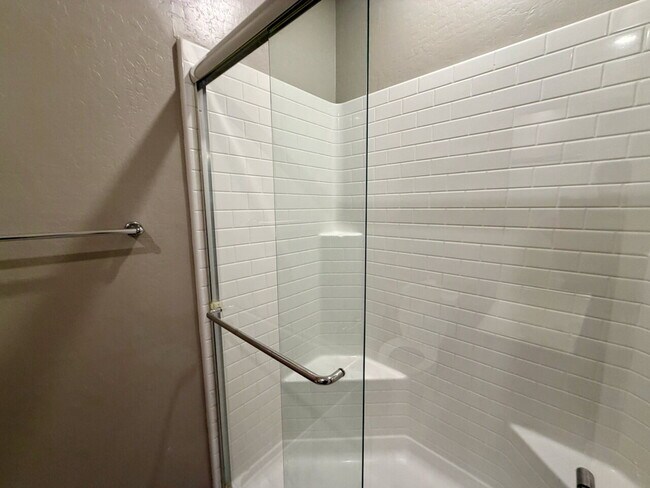 Building Photo - 3 BED 3 BATH 2 CAR GARAGE TOWNHOUSE W/ PRIVATE YARD, LOFT & BEDROOM DOWNSTAIRS IN GATED COMMUNITY...