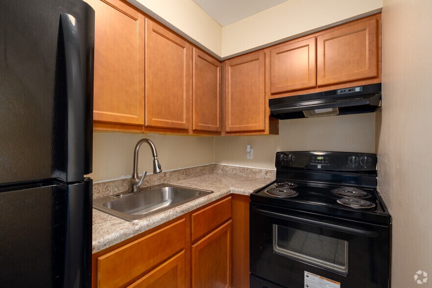 1BR, 1BA - 625SF - Kitchen - Palm Villas