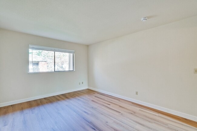 Building Photo - New Vinyl Plank Flooring, Fresh Interior Paint, 1 Car Garage + 1 Assigned Outdoor Parking Space -...