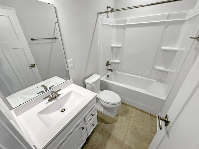 Building Photo - Spacious 3-Bedroom Townhome with Finished ...