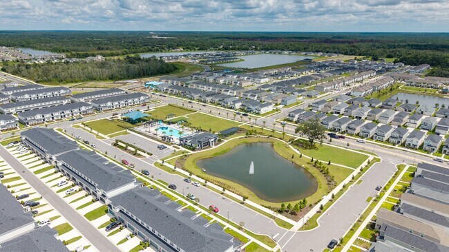 Building Photo - 3BR Center Lake Townhome | 2-Car Garage, Loft & Resort-Style Amenities