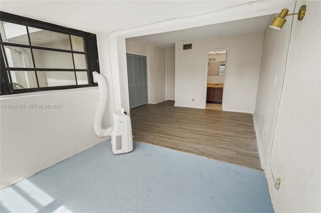 Building Photo - 6556 Racquet Club Dr