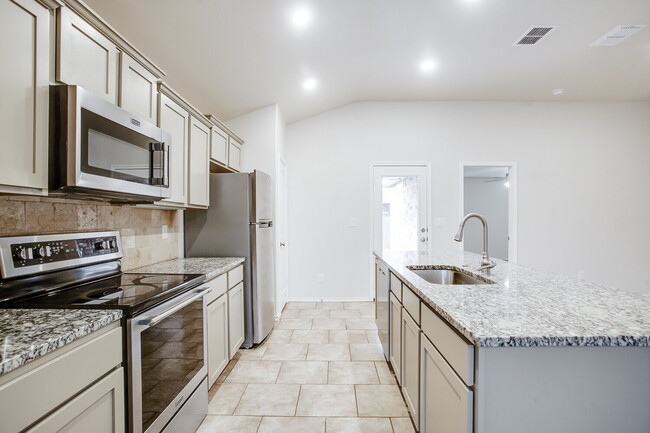 Building Photo - Granite Glam & Backyard Fun: Welcome to Yo...