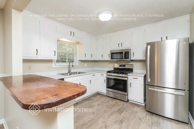 Building Photo - 9015 Sumit Wood Dr NW