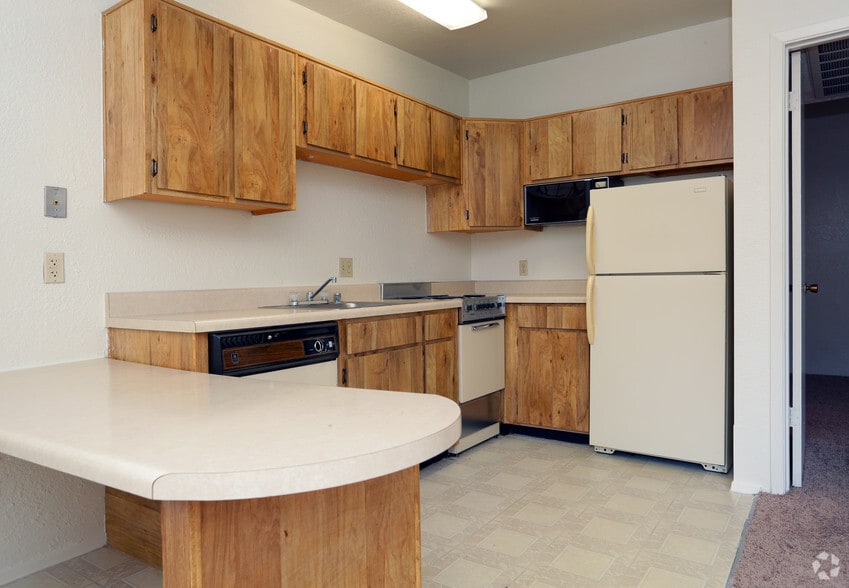 Kithcen has a breakfast bar - Album Park Apartments