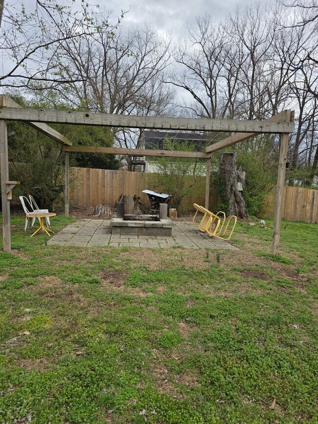 Building Photo - Charming 2BR with Walk-Out Basement, Fenced Yard & Flexible Murphy-Bed Office