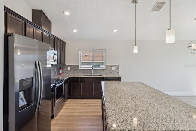 Building Photo - 2256 GLADIOLUS Ln