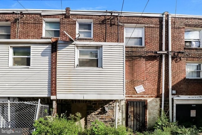 Building Photo - 7037 Elmwood Ave