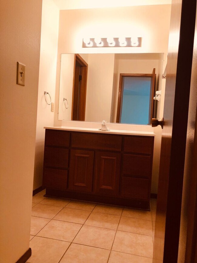 Building Photo - Spruce Court Apartment - Greenfield WI - Call 262-420-0390 to schedule a showing