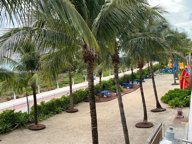 Building Photo - 6039 Collins Ave