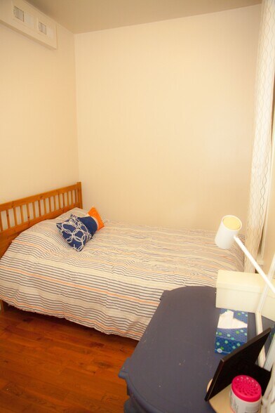Rear bedroom, queen bed - 3443 Sheffield N Ave