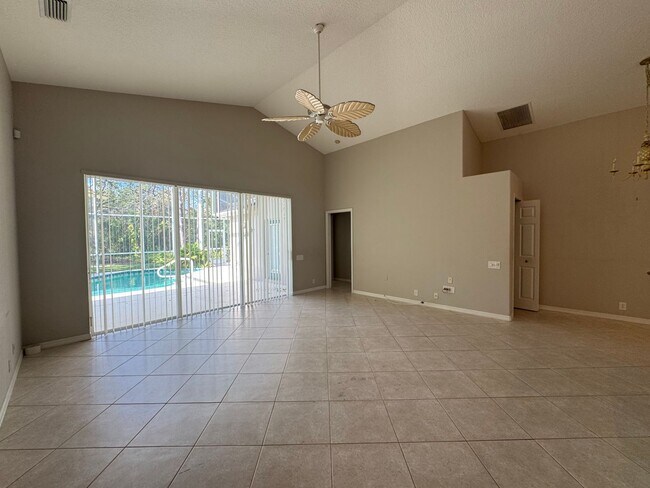 Building Photo - 4 Bedroom 2 Bathroom + Den - Attached Garage and  Heated  Pool!