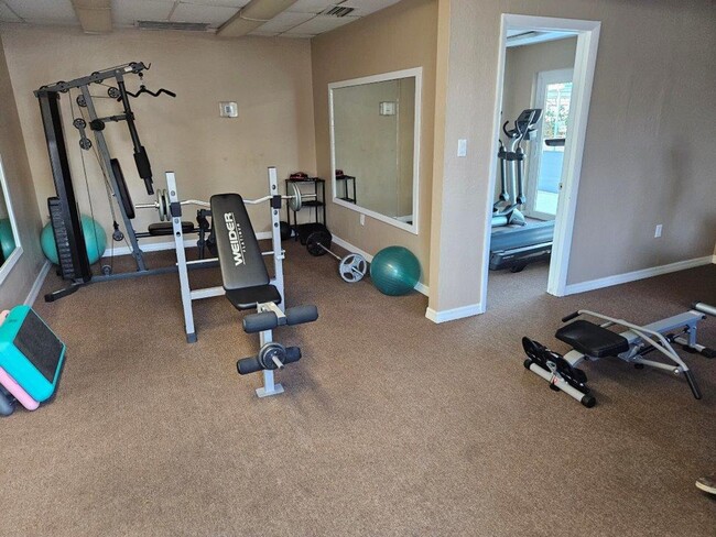 Building Photo - Beautiful fully furnished one bedroom, one bath manufactured home in a 55+ deed restricted gated ...