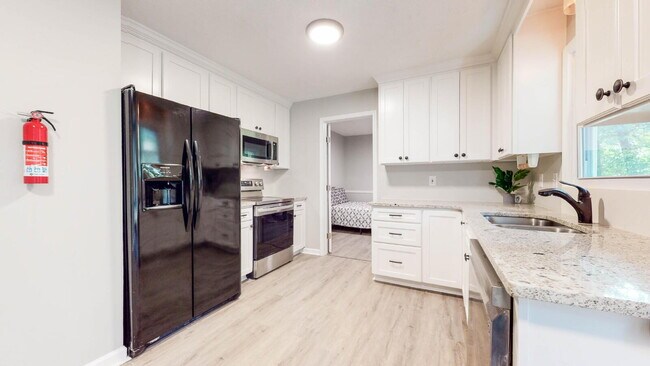 Building Photo - THE CANBERRA| Enjoy convenient living in Bedford Estates, only 2 minutes from the S Hairston Rd &...