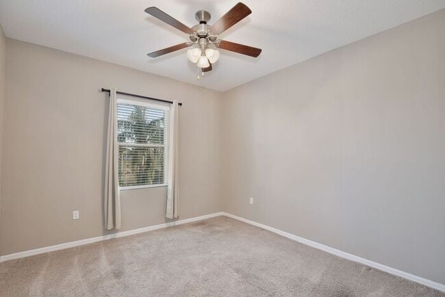 Building Photo - Gorgeous 4/2.5 Spacious Townhome with a Loft Area and a 2 Car Garage in the Desirable Gated Commu...