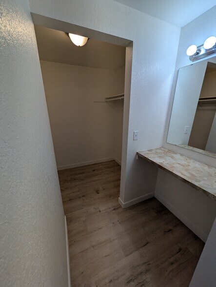 Master with walk-in closet and mirrored vanity - 4617 80th St NE