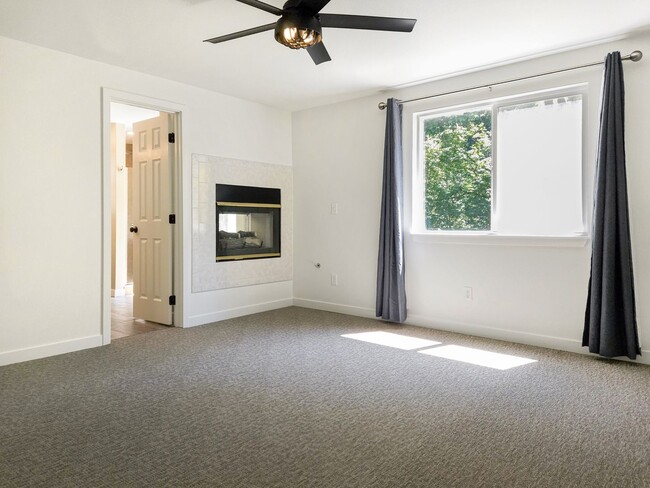 Building Photo - Spacious Remodeled Home with 3 Car Garage,...