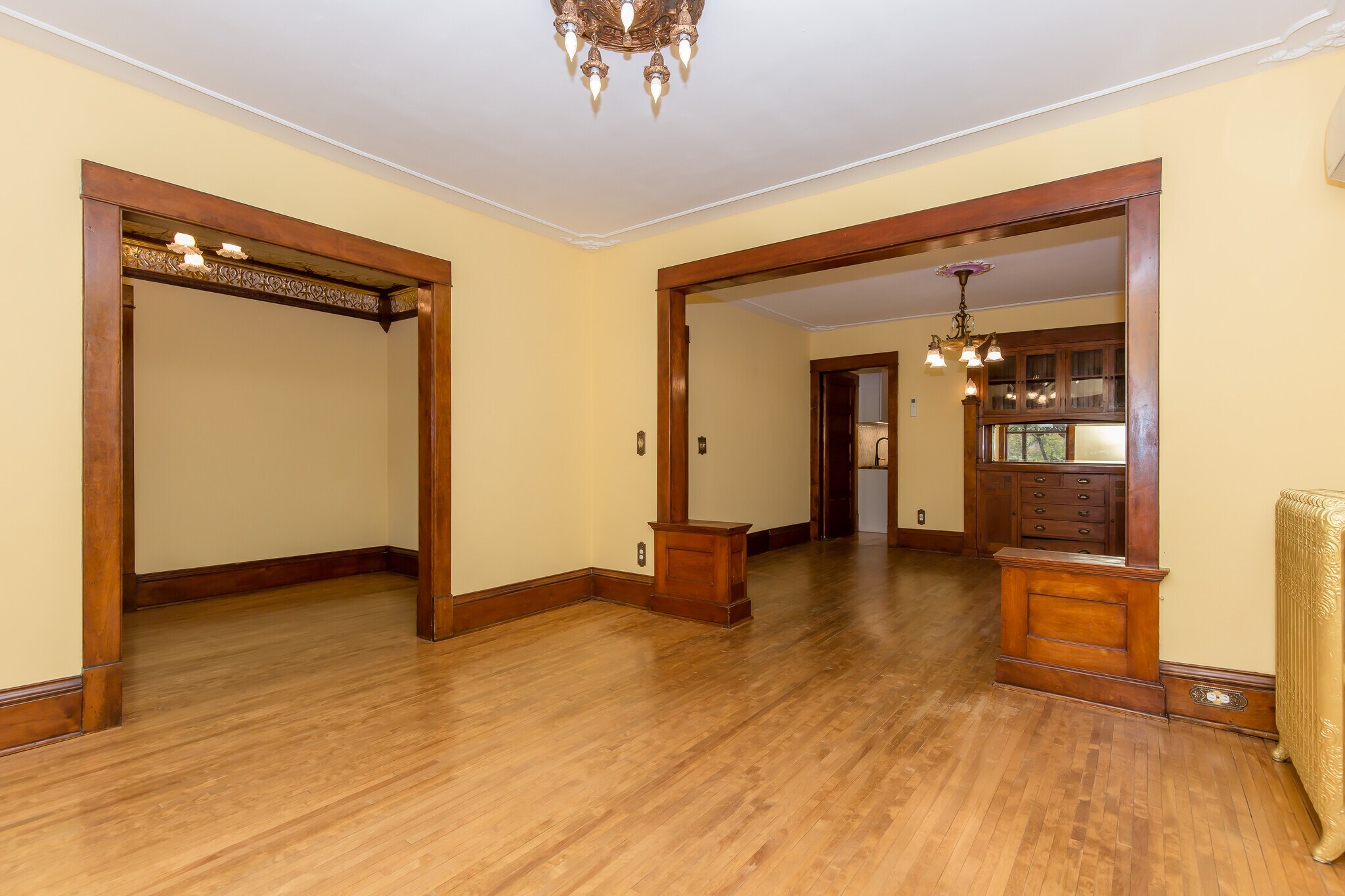 Living Room view of Dining Room and Tin Ceiling Foyer - 715 5th St SE