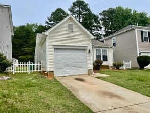 Building Photo - Welcome to the Adorable 3 bedroom 2 bath 1 car garage Home, located in the vibrant city of Charlo...