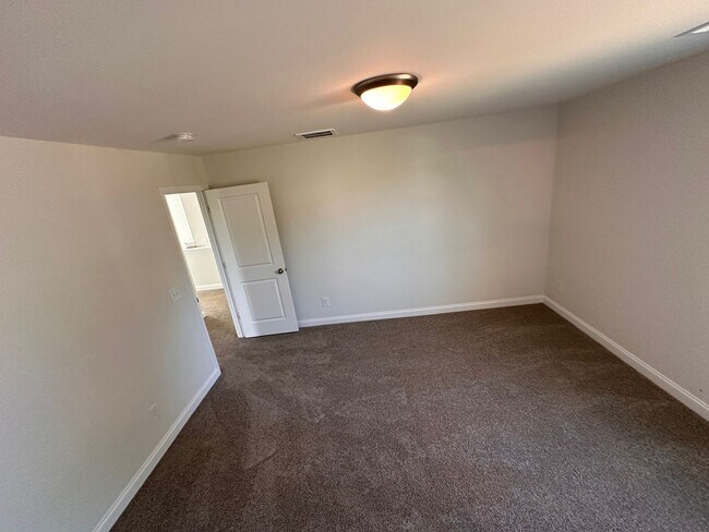 Building Photo - 2024-Built Beautiful 4-Bedroom and 3.5 Bat...