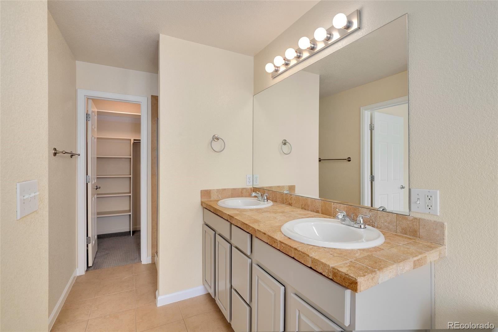 Bathroom 2 Master bathroom and walk in closet - 3680 S Beeler St