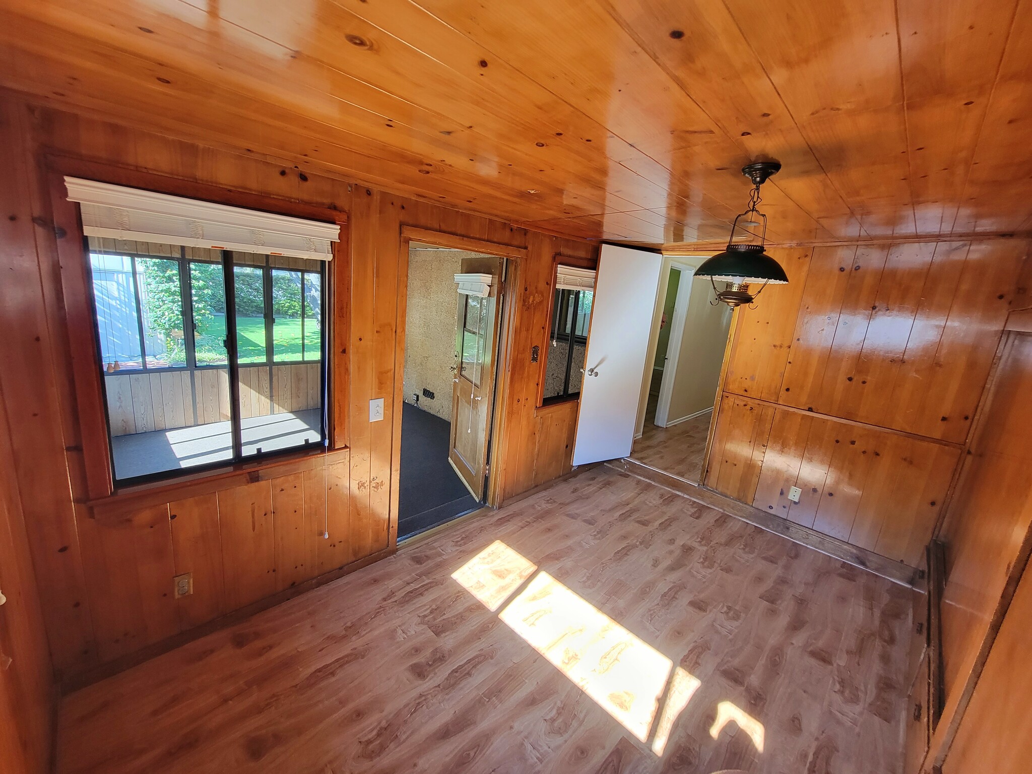 3RD BEDROOM view into attached BONUS/SUNROOM - 12051 Alberta Dr