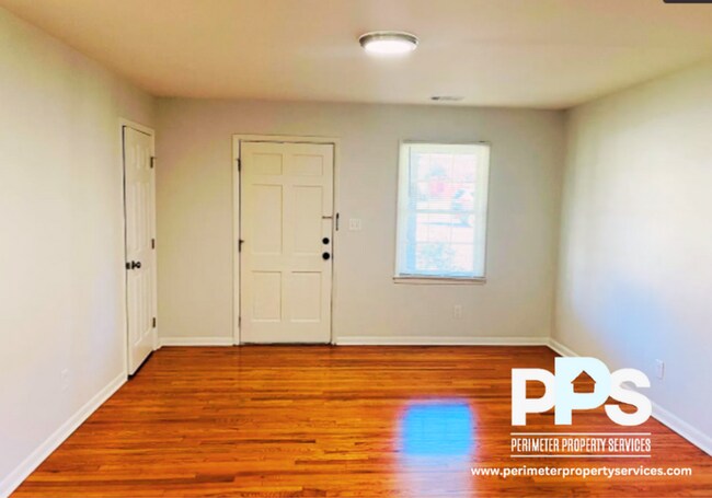 Building Photo - 6127-6129 E Fayetteville Dr