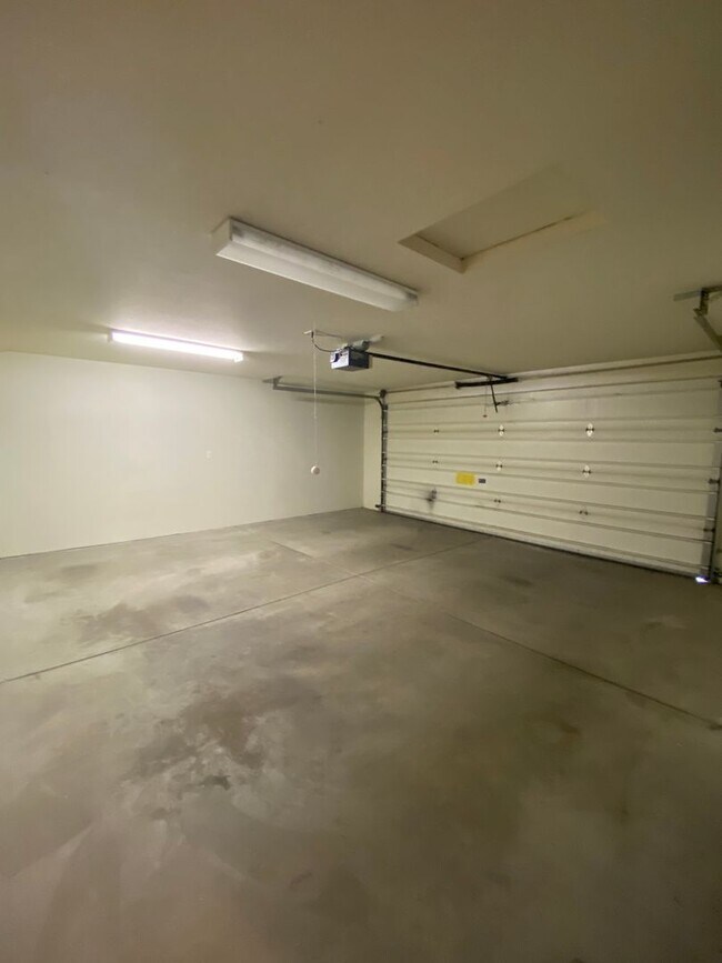 Building Photo - Your Search History Brought You Here: Your Car Gets a Garage. You Get a Backyard. Everybody Wins.