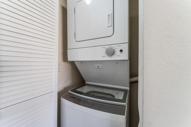 Building Photo - This beautifully renovated 2-bedroom, 2-bath condo is ready for immediate move-in!