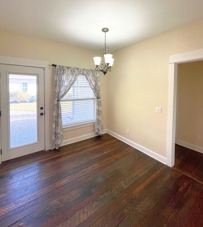 Building Photo - 3/2 updated home with amenities