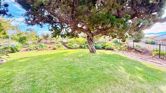 Building Photo - Beautiful Craftsman-style Home with fenced yard space, detached garage and additional parking in ...