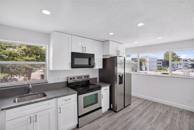 Building Photo - 8390 Sands Point Blvd