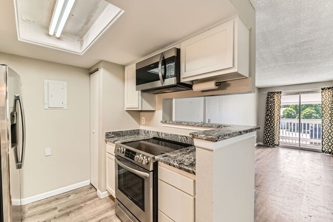 Building Photo - Application fee waived! Sleek 1 bedroom wi...