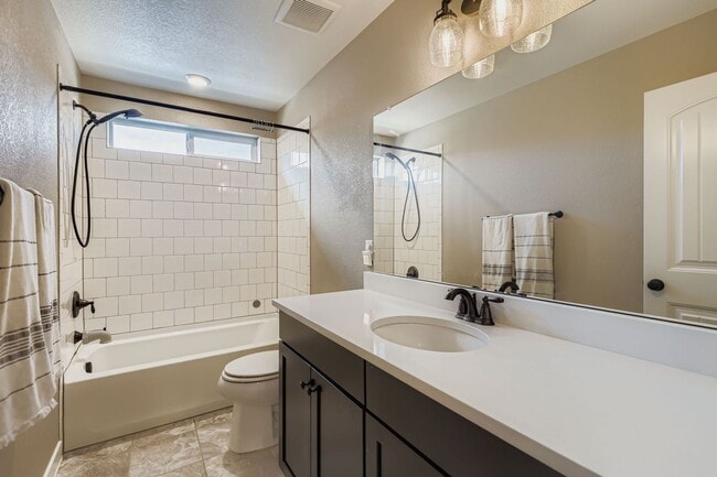 Building Photo - Welcome to this Beautifully Maintained 4-B...