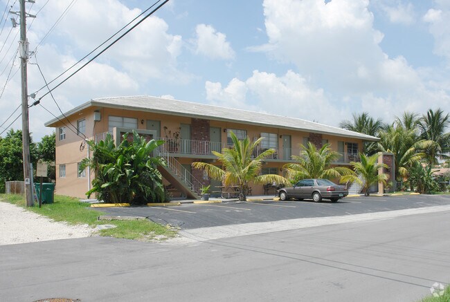 Building Photo - Palm Breeze Luxury Suites
