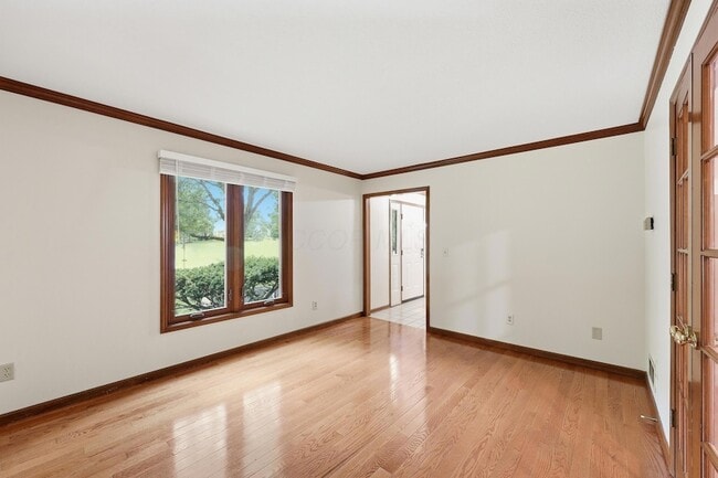 Building Photo - 7666 Windwood Dr