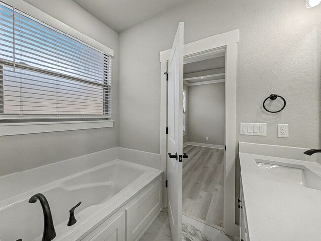 Building Photo - Tucked Into A Prime Spot In Bella Vista Wi...