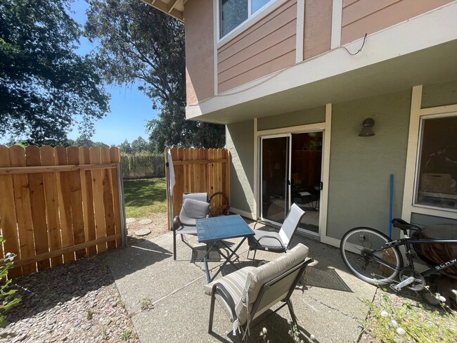 Building Photo - Step into a beautifully refreshed 3-bedroom, 1.5-bath condo that blends comfort, style, and unbea...