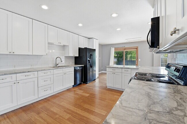 Building Photo - $3,045.95, 3 bed, 2 bath house in Denver with Fenced in Yard and In Unit Laundry!
