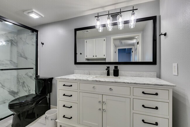 Building Photo - Stylish Fully Furnished 1BR Condo with Private Patio & Custom Closet