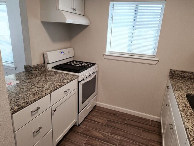 Building Photo - Two bedroom fully remodeled with refrigera...